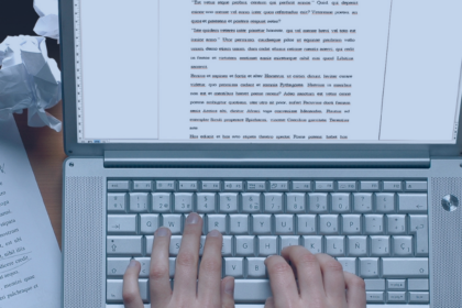Photo of an aspiring writer typing